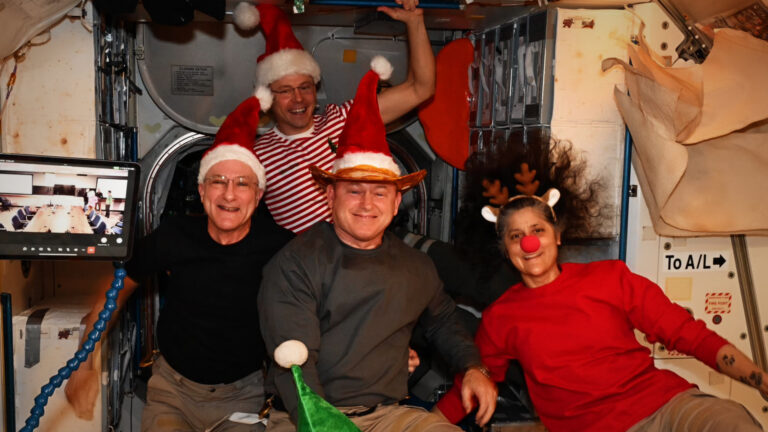 Stranded Astronauts’ Christmas Photo Fuels Wild Conspiracy Theories